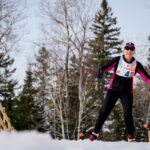 An athlete skiing in the snow