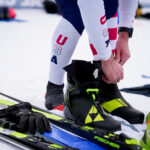 An athlete competing in athletic event sports with helmet outdoors