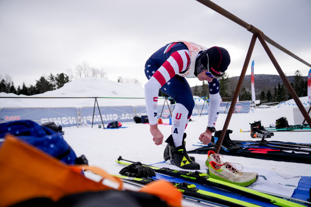 Two athletes competing in athletic event sports in the snow
