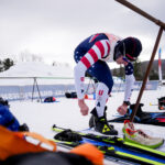 Two athletes competing in athletic event sports in the snow