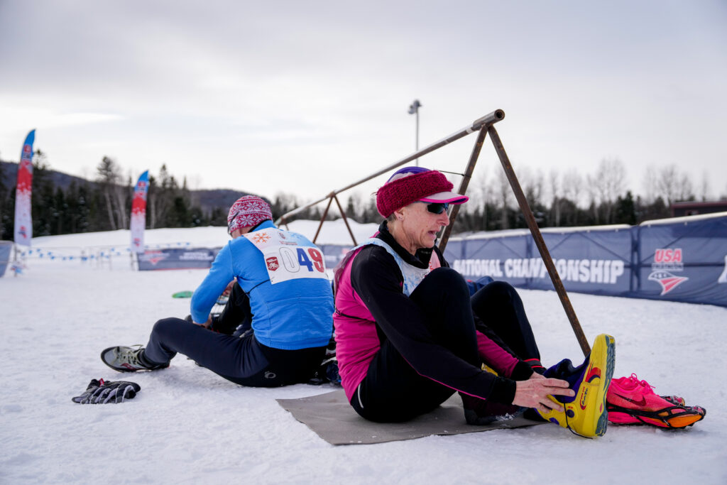 Two athletes competing in athletic event sports