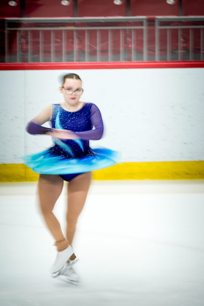 An athlete skating on the rink