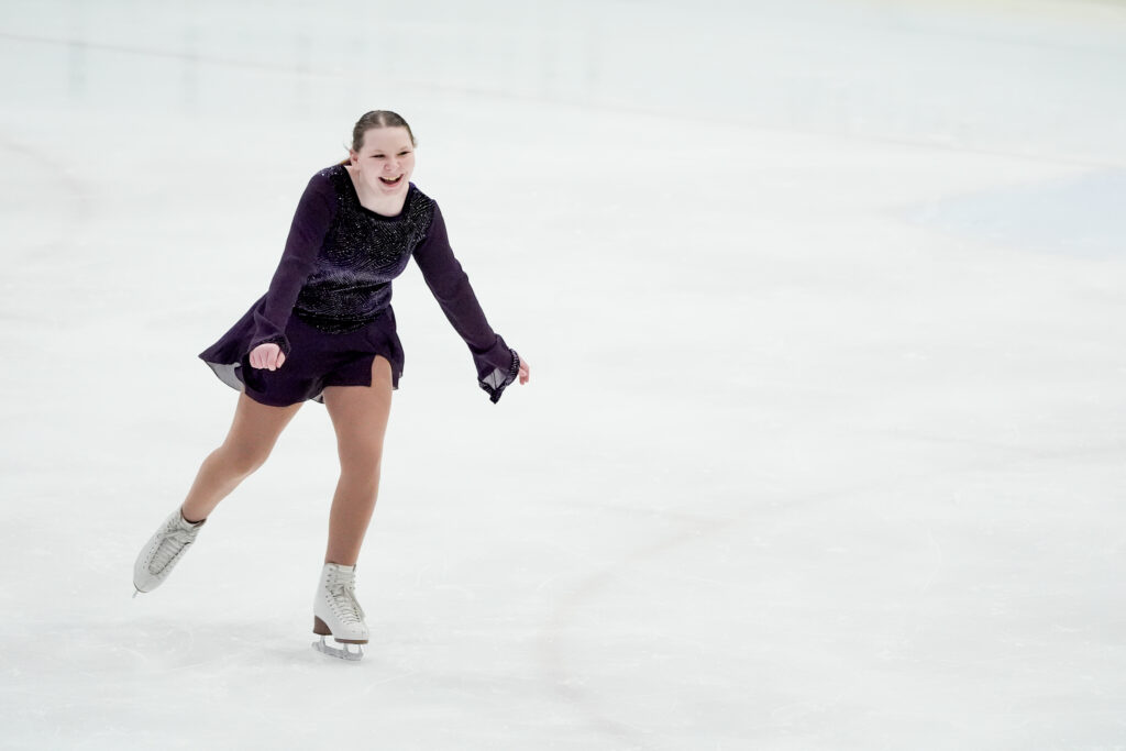 An athlete skating on the rink