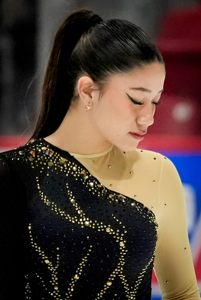 An athlete competing in athletic event sports