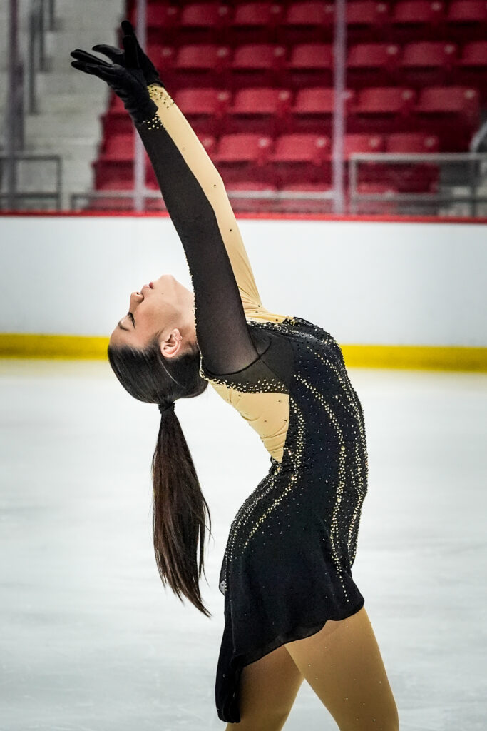 An athlete skating on the rink