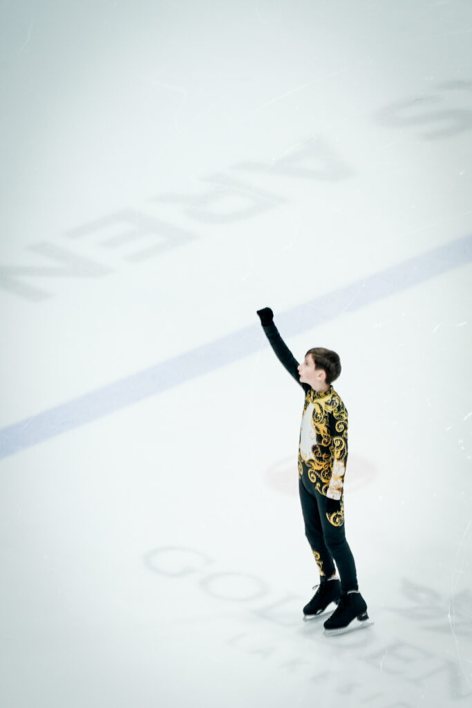 An athlete skating on the rink