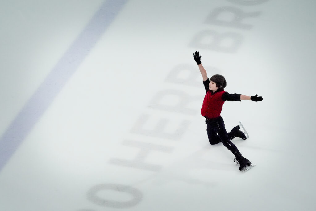 An athlete skating on the rink