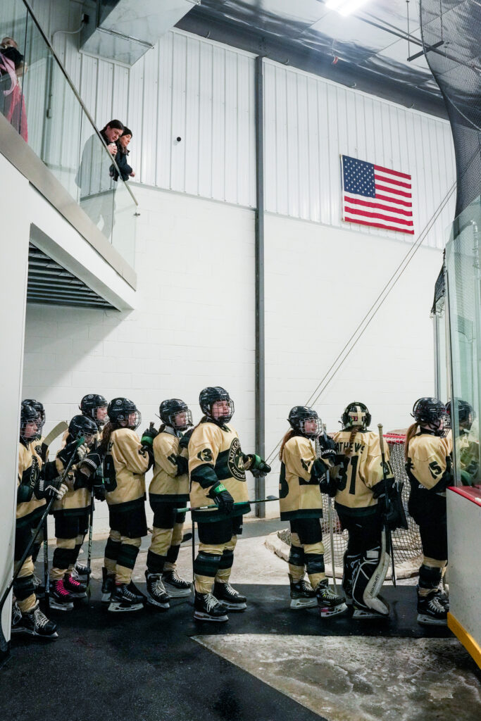 A group of athletes competing in athletic event sports with helmet