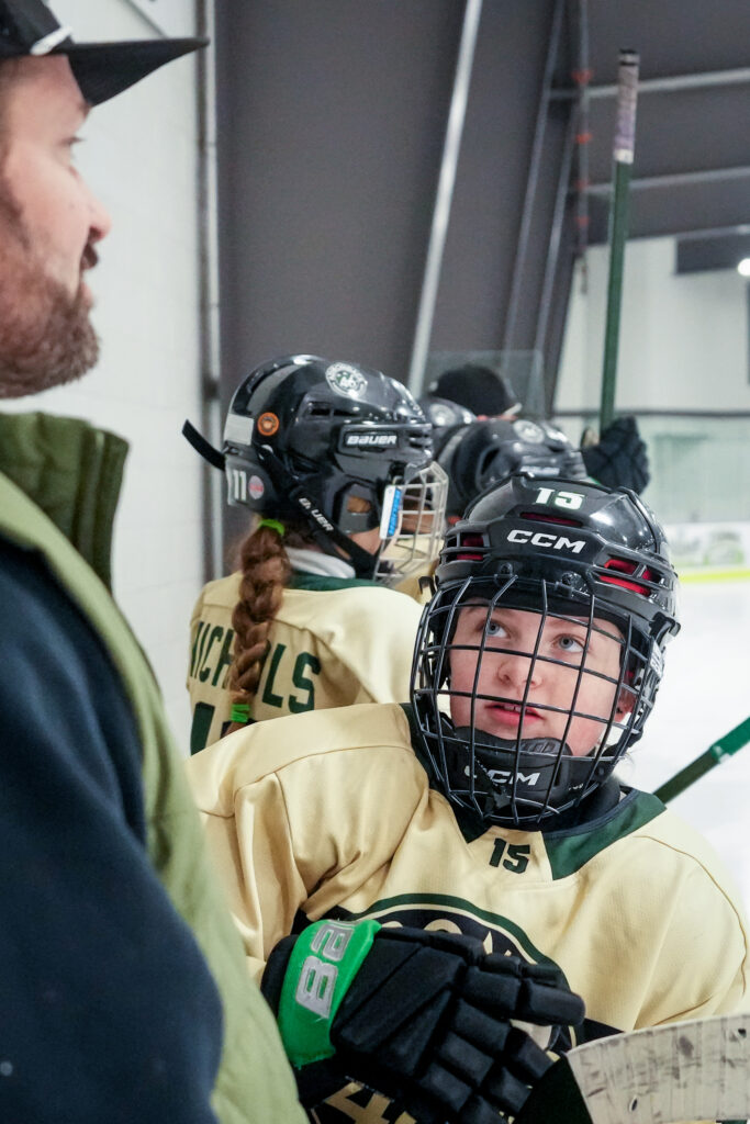 A group of athletes competing in athletic event sports with helmet