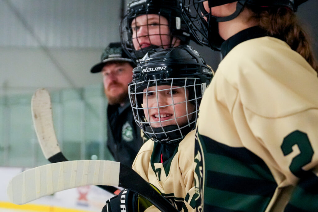 A group of athletes competing in athletic event sports with helmet
