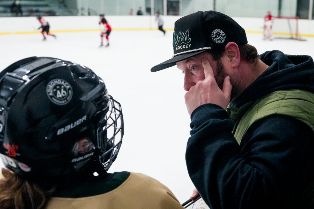 A group of athletes competing in athletic event sports with helmet
