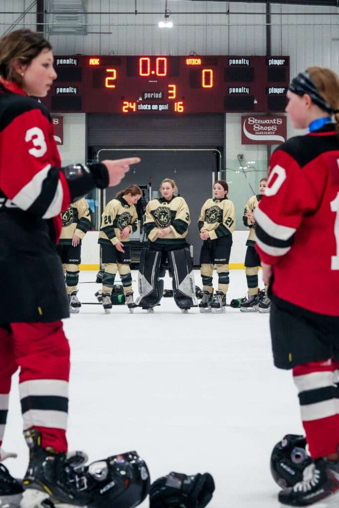 A group of athletes competing in athletic event sports with helmet