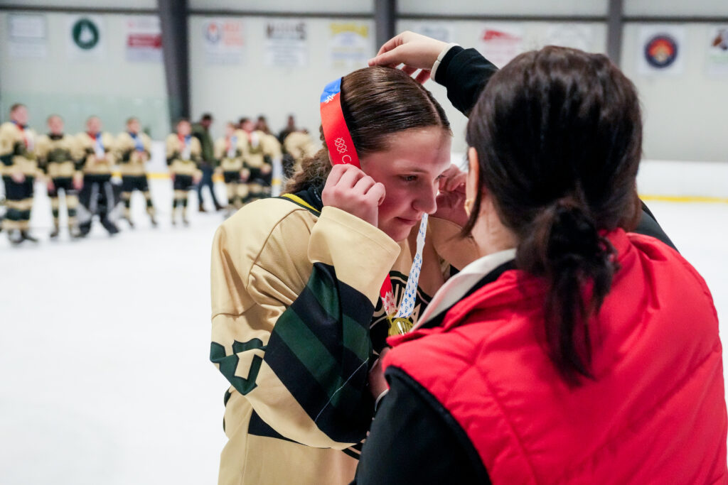 A group of athletes competing in athletic event sports
