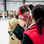 A group of athletes competing in athletic event sports