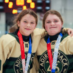 Two athletes competing in athletic event sports