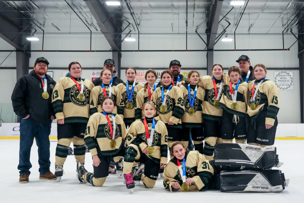 A group of athletes competing in athletic event sports