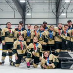 A group of athletes competing in athletic event sports