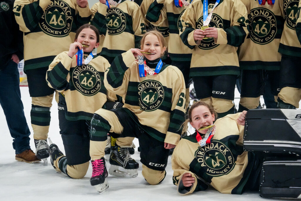 A group of athletes competing in athletic event sports