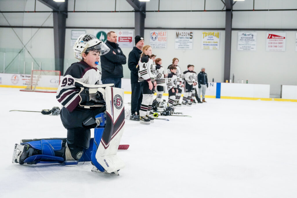 A group of athletes competing in athletic event sports with helmet