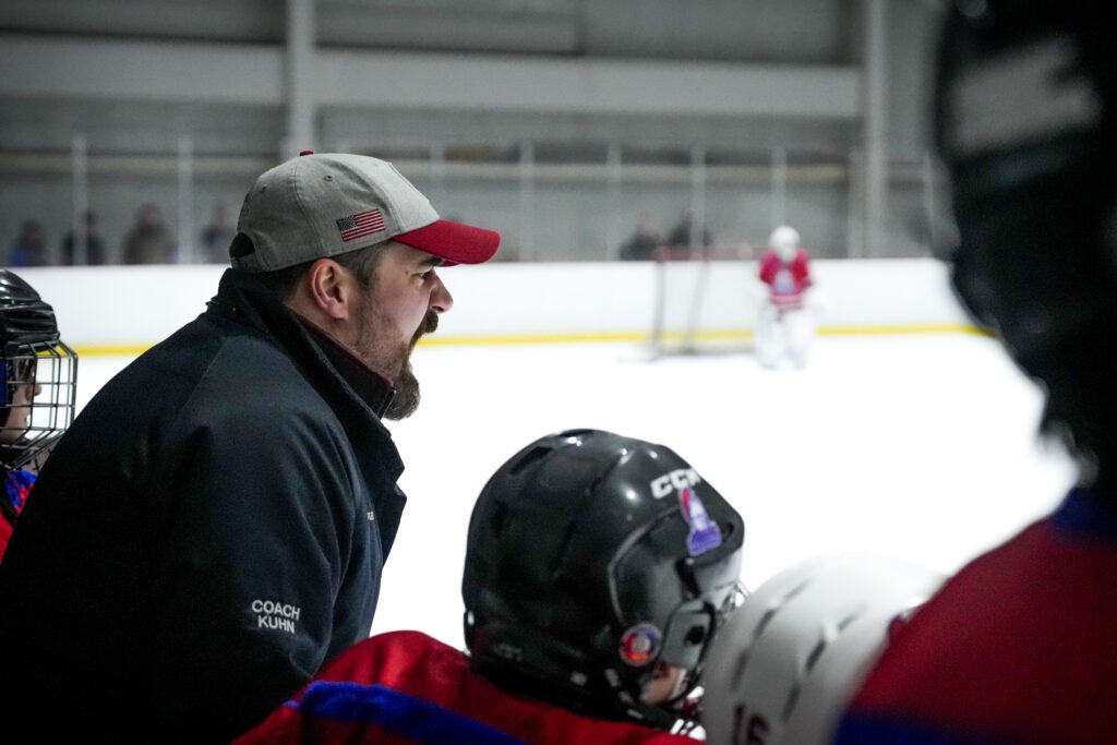 A group of athletes competing in athletic event sports with helmet