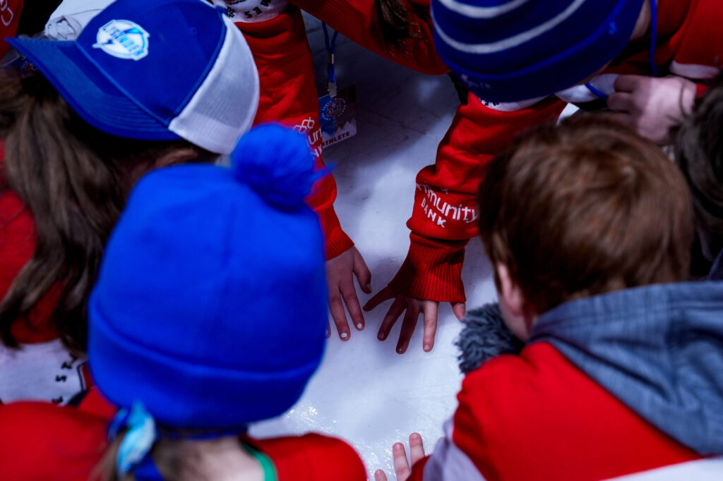 A group of athletes competing in athletic event sports