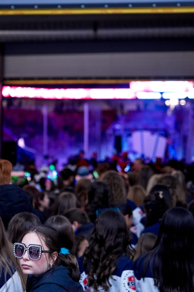 A group of athletes competing in athletic event sports
