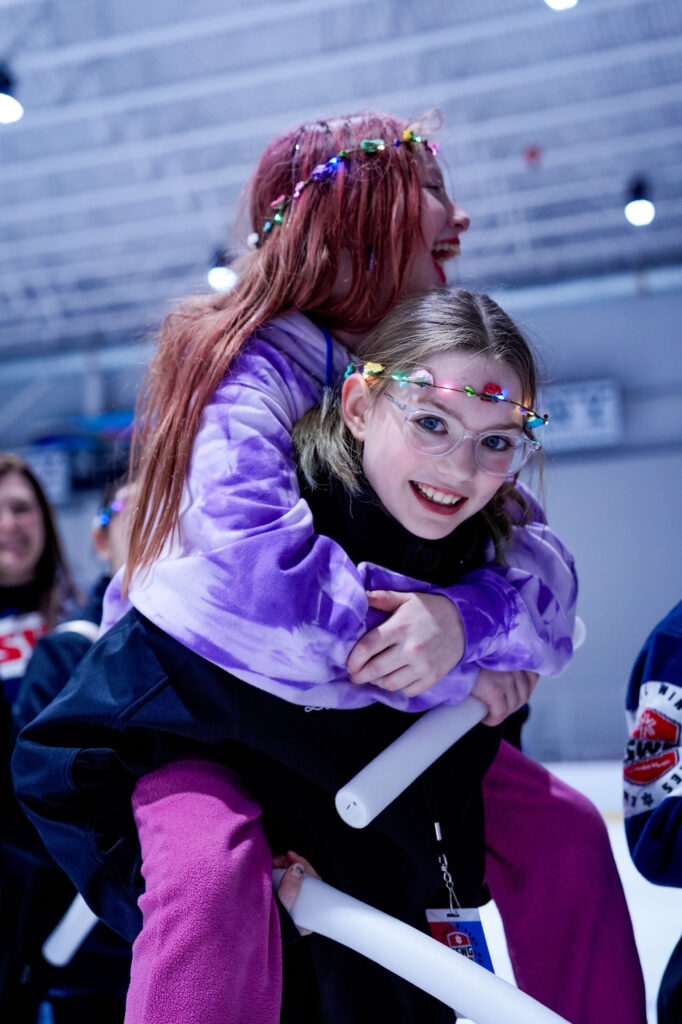 A group of athletes competing in athletic event sports