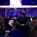 A group of athletes competing in athletic event sports