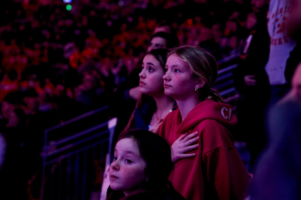 A group of athletes competing in athletic event sports