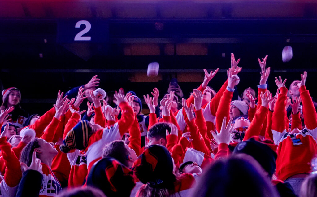 A group of athletes competing in athletic event sports