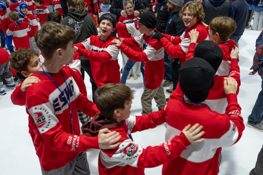 A group of athletes competing in athletic event sports