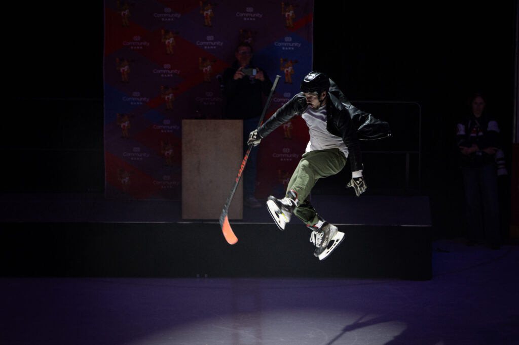A group of athletes competing in athletic event sports with helmet
