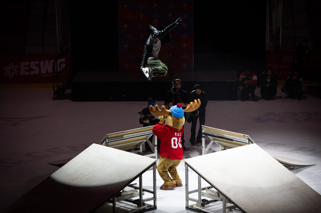 A group of athletes competing in athletic event sports