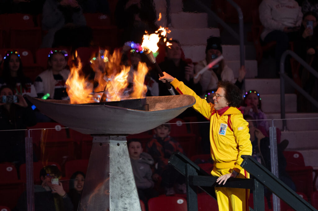 A group of athletes competing in athletic event sports