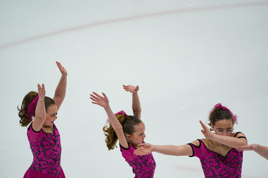 A group of athletes competing in athletic event sports