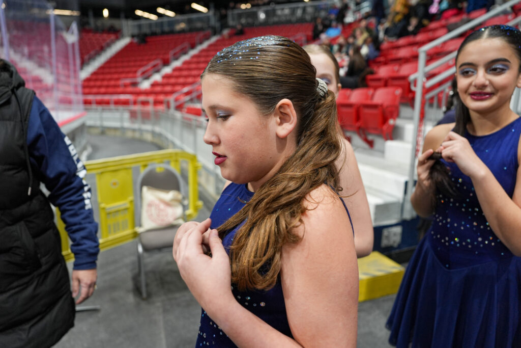 A group of athletes competing in athletic event sports