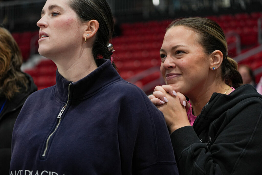 A group of athletes competing in athletic event sports