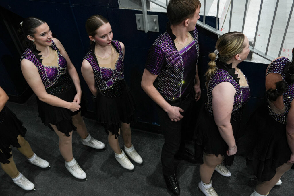 A group of athletes competing in athletic event sports