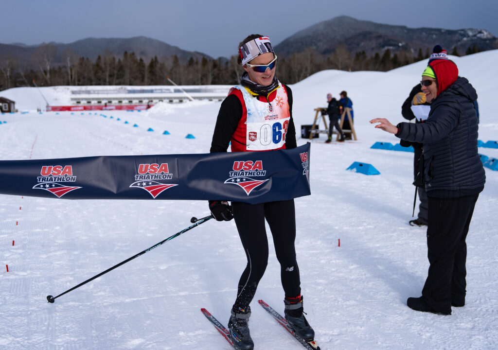 A group of athletes skiing in the snow