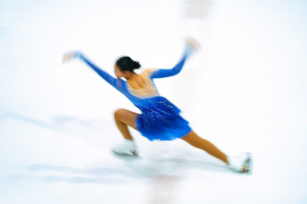 An athlete competing in athletic event sports