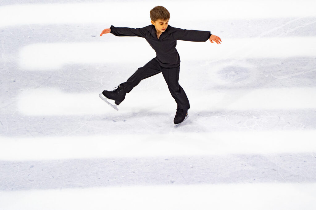 An athlete skating on the rink