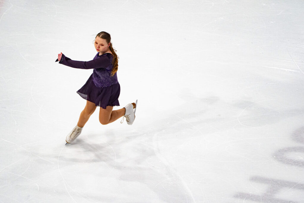An athlete skating on the rink