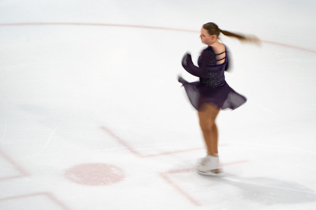 An athlete skating on the rink