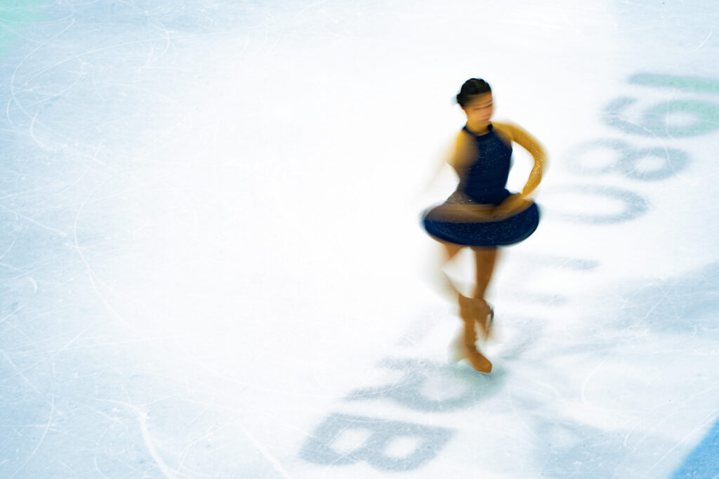 An athlete skating on the rink