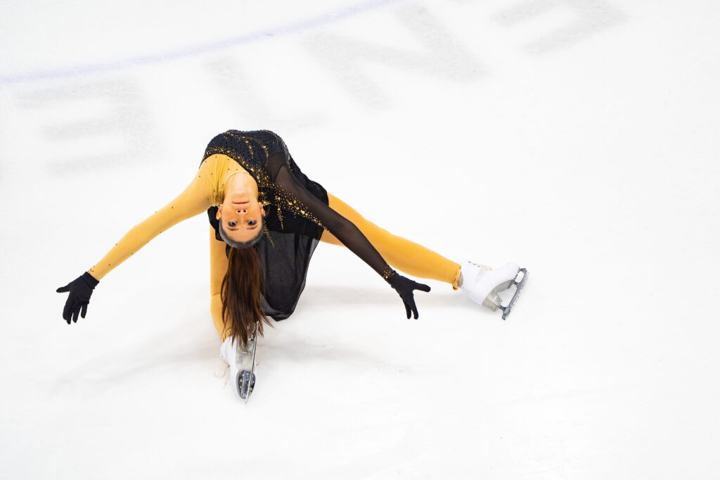 An athlete skating on the rink
