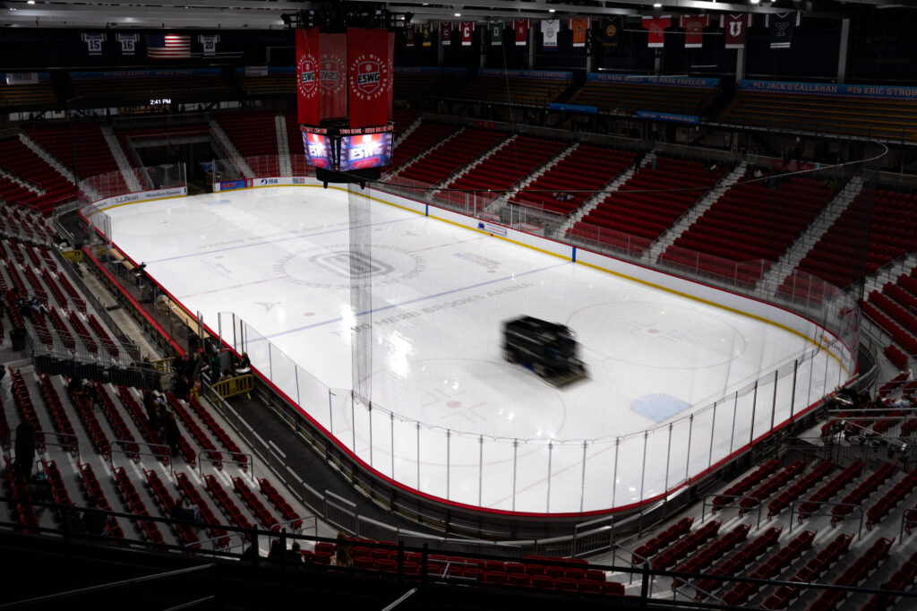 A group of athletes skating on the rink