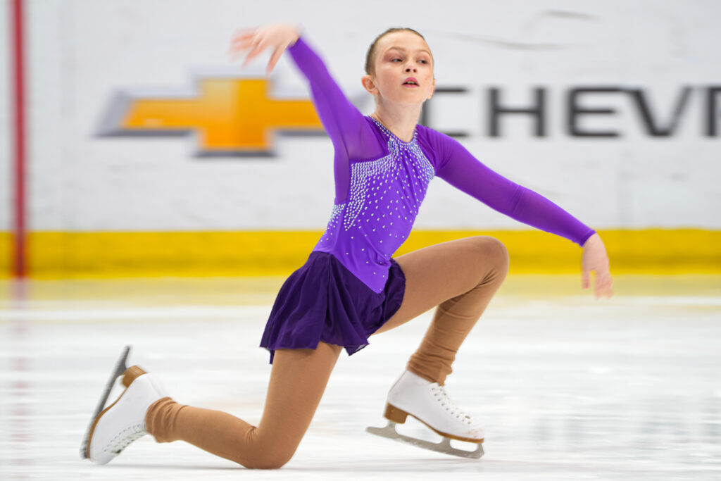 An athlete skating on the rink