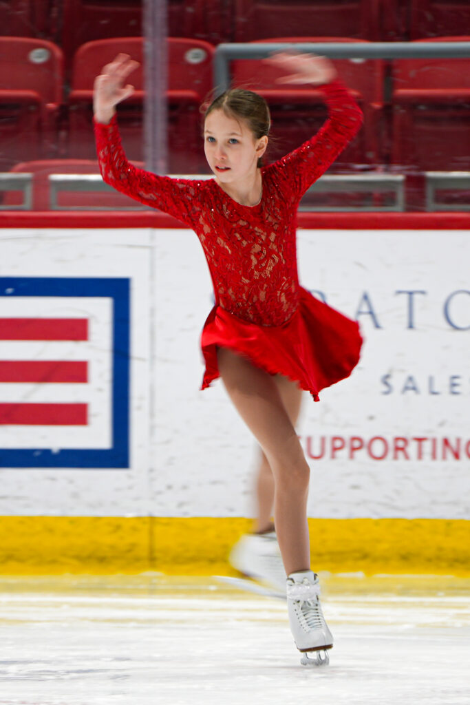 An athlete skating on the rink