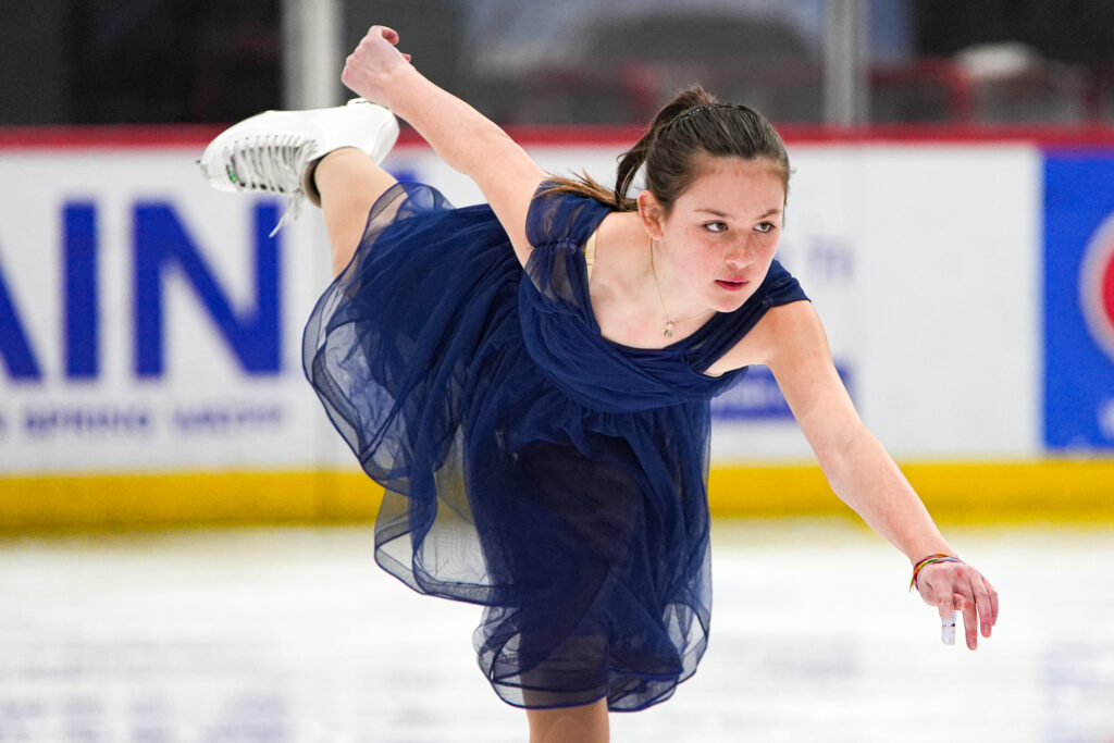 An athlete skating on the rink