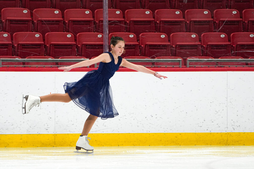 An athlete skating on the rink